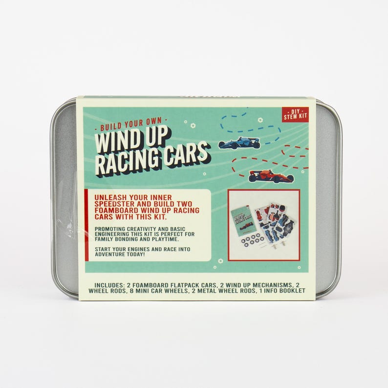 May include: A DIY STEM kit in a silver tin. The kit includes two foamboard flatpack cars, wind-up mechanisms, wheels, and a booklet. The box features the text "Build Your Own Wind Up Racing Cars" with illustrations of race cars.