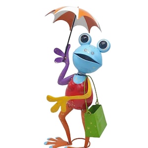 Metalen kikkertuinstandbeeld met blauw gezicht met oranje paraplu