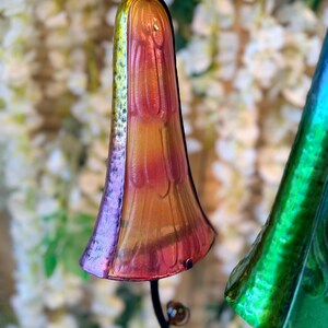a colorful glass sculpture with a vibrant, multicolored design.