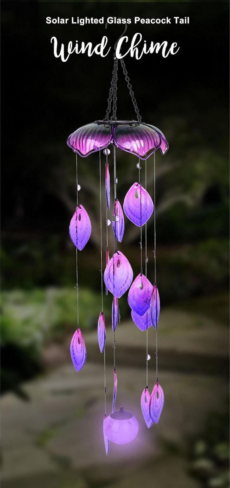 A solar-lit glass peacock tail wind chime with a variety of purple and pink feathers hanging from it.