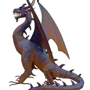 A metal dragon sculpture with a fierce expression and outstretched wings.