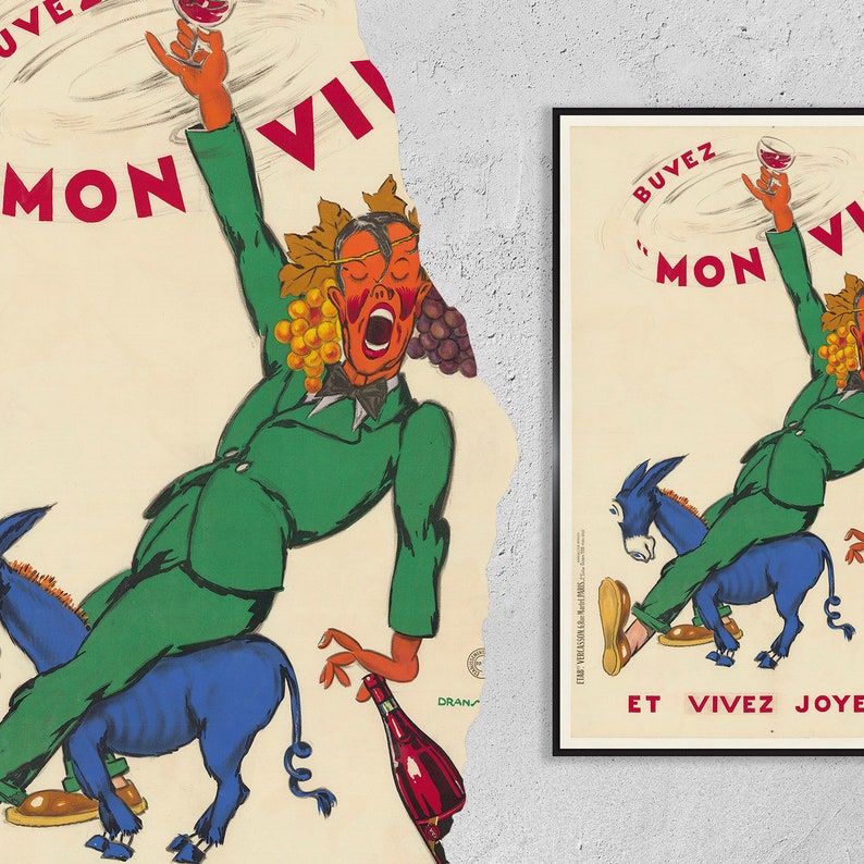 K&ouml;nnte beinhalten: Ein Vintage-franz&ouml;sisches Weinposter mit einem Mann, der auf einem Esel reitet, ein Glas Wein und eine Weinflasche h&auml;lt. Das Poster ist in einem schwarzen Rahmen und tr&auml;gt den Text "Buvez Mon Vin et Vivez Joye".