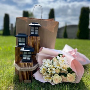 Lamp, lantern, night light, yard decor, garden lantern, pathway lighting, outdoor decor, solar light, decorative lighting.