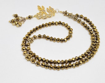Islamitische tasbih met kristallen kralen en Allah-bedel - metallic gouden gebedskralen