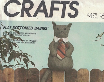 1980s Vintage Craft Sewing Pattern McCalls 2131 Flat Bottomed Babies KC Creations Stuffed Cat Doll Home Decor UNCUT