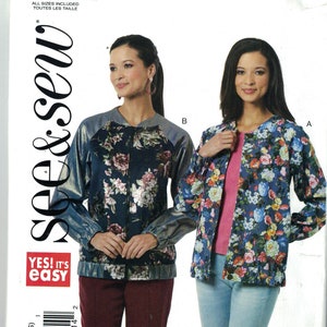 May include: A sewing pattern for a jacket with two different styles. The jacket on the left has a floral print with a silver metallic detail on the sleeves. The jacket on the right has a floral print with a solid blue collar. The pattern is called "see & sew" and is labeled "B6618".