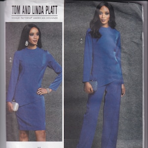 May include: A sewing pattern for a dress and pants set. The pattern is for sizes 6-8-10-12-14. The dress is a knee-length, fitted dress with a high neck and long sleeves. The pants are wide-leg pants with a high waist.