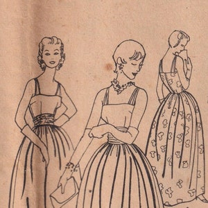 May include: A vintage sewing pattern for a dress with a full skirt. The pattern is for size 4291 and is printed in the USA.