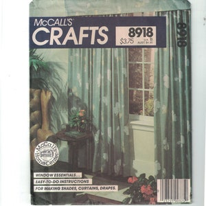 May include: A vintage McCall's Crafts sewing pattern for window treatments. The pattern number is 8918 and the price is £3.75. The pattern features a floral design and instructions for making shades, curtains, and drapes.