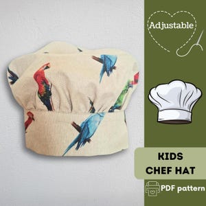 May include: A beige kids' chef hat with a colorful parrot pattern. The hat features a classic chef's hat design with an adjustable feature. The image also includes the text "KIDS CHEF HAT" and "PDF pattern".