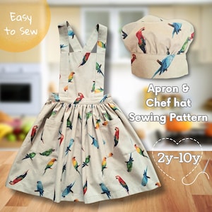 Peut inclure: Un patron de couture de tablier et de toque de chef beiges avec un imprimé perroquet coloré. Le tablier a deux poches et un bas de jupe. La toque de chef est de conception classique. Le texte sur l'image indique "Easy to Sew", "Apron & Chef hat Sewing Pattern" et "2y-10y".