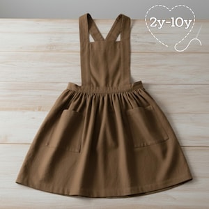 Modello di cucito per grembiule classico con volant per bambini: incrociato sul retro, tasche (download PDF, taglie 2-10 anni)