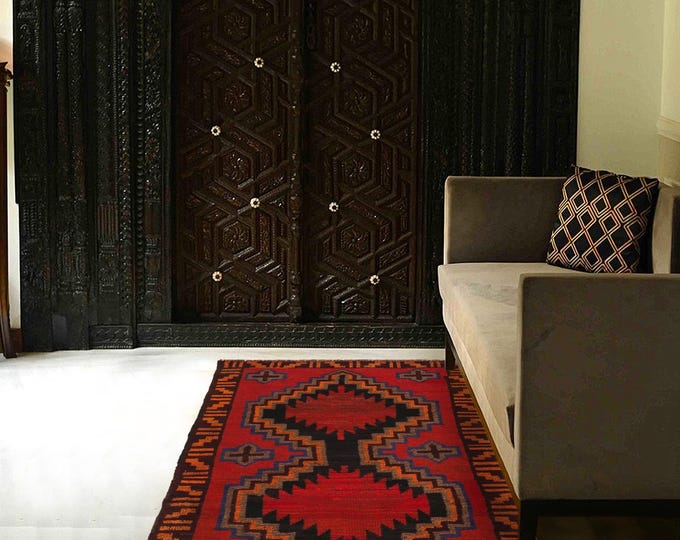 Hand-knotted Baluchi in Black and Orange 2.95 x 4.59 ft