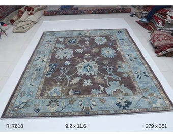 Hand-knotted Oshak Wool Rug Floral  in Brown base and Blue border, 9.2 x 11.6 ft