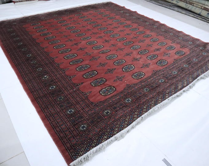 Handmade Wool Mori Bokhara Rug – 8x9 ft, Brown Rust Tribal Design