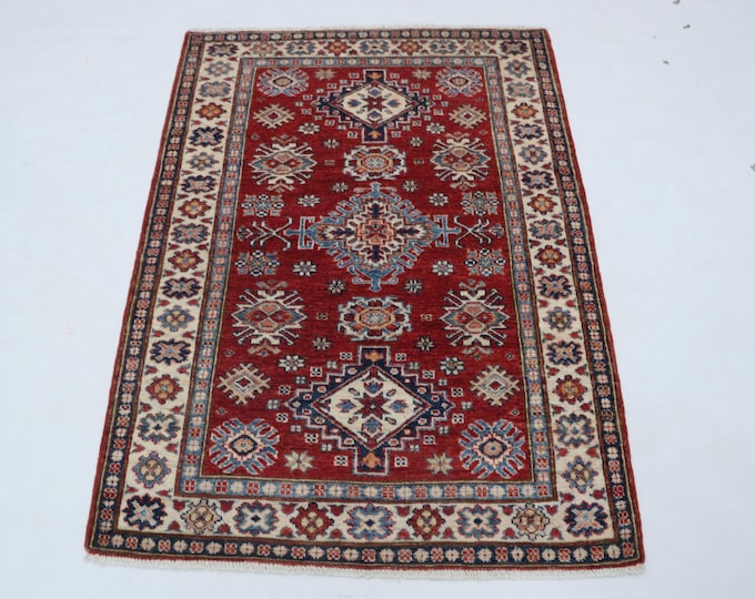 3.5 X 4.9 ft Red and Beige Geomatrical Handmade, Super Kazak Cotton and Wool