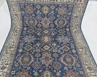 5.5 X 8 ft Handmade Floral Tribal Rug, Blue and Beige, Cotton and Wool