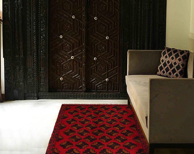 Hand-knotted Baluchi in Brown and Orange 2.95 x 4.59 ft