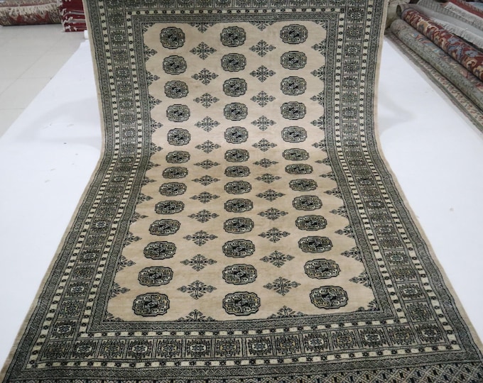 Hand Knotted Wool Mori Bokhara Rug, 6x9 Beige Geometric Area Rug