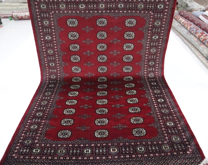 Hand Knotted Wool Mori Bokhara Rug, 5.6x8.3 ft, Red Geometric Tribal Rug