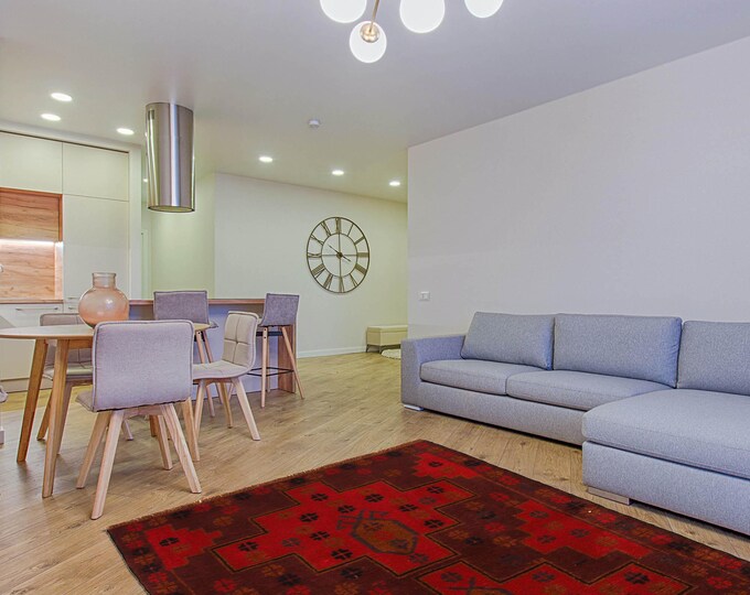 Hand-knotted Baluchi in Brown and Orange 2.95 x 4.59 ft