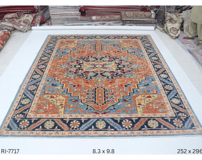 Hand-knotted Heriz Cotton and Wool Rug, Floral in Orange base and Blue border, 8.3 x 9.8 ft