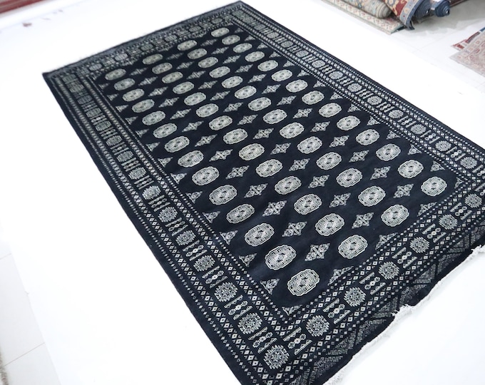 7 X 10 ft Handmade Geometrical Mori Bokhara Rug, Black, Cotton and Wool