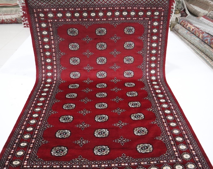 Hand Knotted Mori Bokhara Wool Rug, Red Geometric Oriental Rug (6x9 Ft)