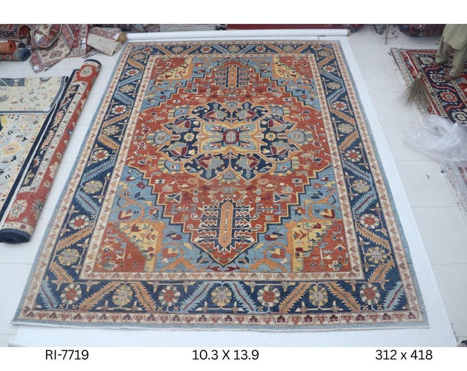 Hand-knotted Heriz Cotton and Wool Rug, Floral in Orange base and Blue border, 10.3 x 13.9 ft