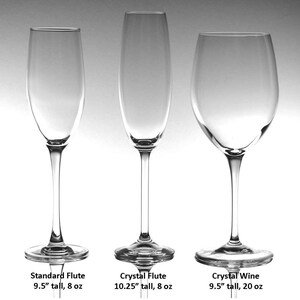 May include: Three clear glass stems: a Standard Flute at 9.5 inches tall and 8 ounces, a Crystal Flute at 10.25 inches tall and 8 ounces, and a Crystal Wine glass at 9.5 inches tall and 20 ounces, all featuring slender stems and circular bases.