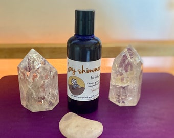 JOY shimmer body and massage oil with herkimer diamond citrus and vanilla