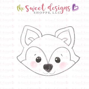 May include: A black and white line drawing of a fox's face with blush on its cheeks. The fox has large, round eyes and a small, black nose.