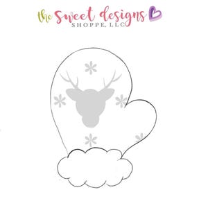May include: A mitten-shaped cookie cutter with a deer head and snowflake design. The text "the Sweet designs SHOPPE, LLC" is at the top. The mitten has a fluffy bottom edge.