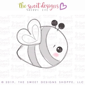 May include: A black and white illustration of a cartoon bee with a heart-shaped wing. The bee has a black and white striped body and a pink blush on its cheek.