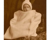 Antique Photograph  Baby with Cone Shaped Hat Wrapped Securely in Their Blanket
