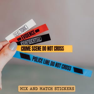 May include: A set of five crime scene themed stickers. The stickers are black, yellow, blue, red, and white with black text. The text on the stickers reads "Toxic", "Evidence", "Confidential", "Crime Scene Do Not Cross", and "Police Line Do Not Cross".