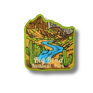 May include: Embroidered patch featuring a landscape of Big Bend National Park. The patch has a green border and depicts a blue river, green cacti, and brown mountains. The text "Big Bend National Park" is also included.