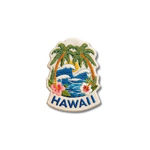 May include: An embroidered patch featuring a tropical scene with two palm trees, blue ocean waves, and a yellow sun. A pink hibiscus flower is on the left and a white hibiscus flower is on the right. The word HAWAII is stitched in blue at the bottom.
