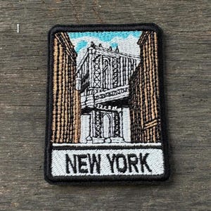 Broderad lapp i New York City – Applikation för resesouvenirer