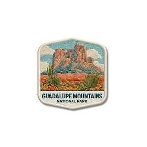 May include: A hexagonal embroidered patch featuring a landscape of the Guadalupe Mountains National Park. The design includes tan rocky peaks, green cacti, and a desert floor under a blue sky with white clouds. The text reads GUADALUPE MOUNTAINS NATIONAL PARK.