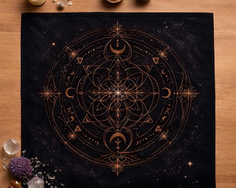 May include: Black altar cloth with a celestial design in copper tones. The design features geometric shapes, moons, stars, and a central floral motif. The cloth is surrounded by crystals, candles, and other spiritual items.