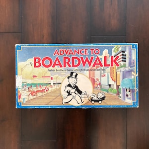 Vintage “Advance to Boardwalk” Game Board by Parker Brothers. Quick And Fun Spin-Off Of Monopoly. Game Pieces Appear To Be All Here.