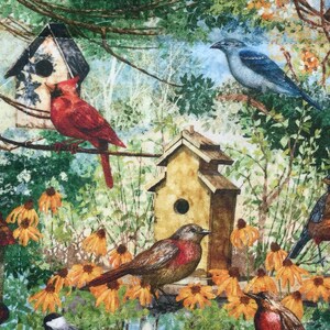 May include: A colorful illustration of a birdhouse scene with a bluebird, a cardinal, a robin, and a brown bird. The birdhouses are painted in shades of brown and yellow. The background is a lush green forest with yellow flowers.