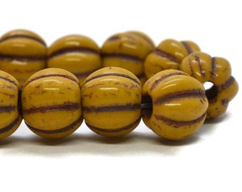 Melon Beads 8mm Large Hole Corrugated Melons Yellow Gold with a Brown Wash Approx. 20 pcs