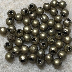 50 Antique Brass Plated Smooth Round Beads 4mm Made in the USA F318B