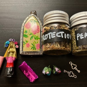 Made-to-order: Your custom choice Santa Muerte amulet