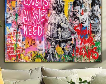 May include: A colorful abstract painting with the words "Love is All We Need" in pink neon lettering. The painting features two children, a dog, and a variety of other abstract shapes and designs.