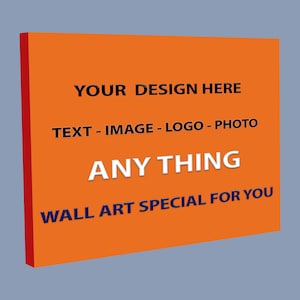 May include: An orange wall art piece with the text "YOUR DESIGN HERE", "TEXT - IMAGE - LOGO - PHOTO", "ANY THING", and "WALL ART SPECIAL FOR YOU" in black and white fonts. The wall art has a red side and is set against a grey background.