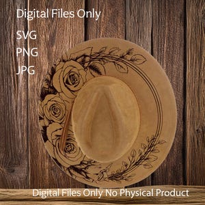 May include: A brown fedora hat with a black floral design featuring roses and leaves. The hat is on a wooden background. Digital Files Only. No Physical Product. SVG, PNG, JPG.
