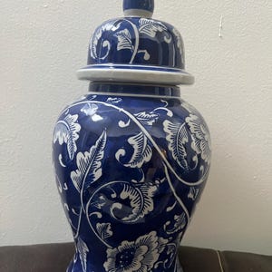 white and blue decorative porcelain vase